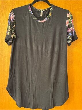 Acting Pro Black Tee with Multicolor Floral Trim